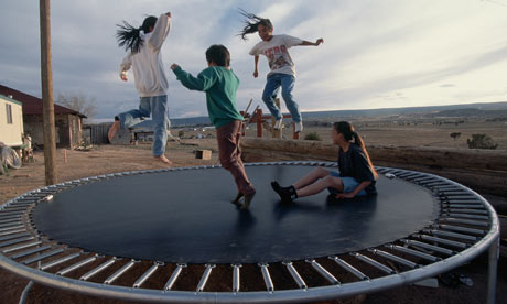 Children-jumping-on-a-tra-001