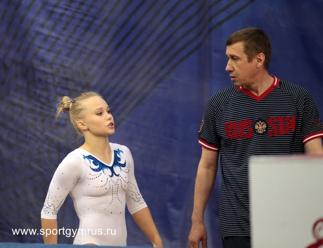 With her coach Sergei Denisovich